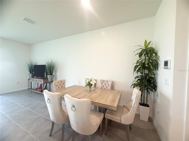 Furnished interior view inside a new home in , Kissimmee (Image 30).