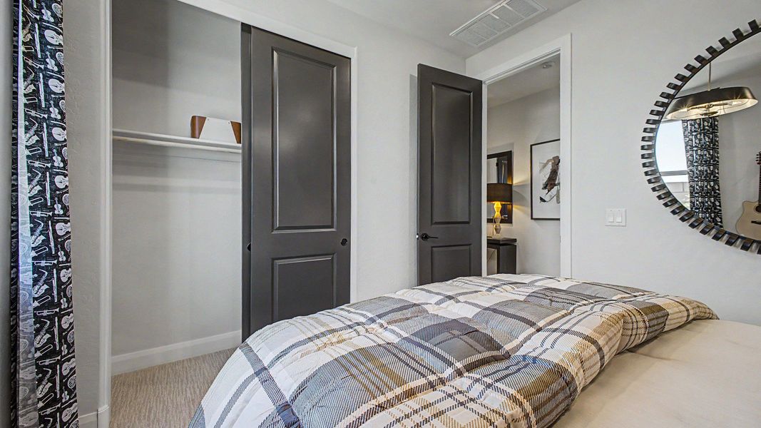 Guitar-themed secondary bedroom in this quick move-in new home by DRB Homes at Saguaro Hills at Vistancia. Guitar-themed secondary bedroom in this quick move-in new home by DRB Homes at Saguaro Hills at Vistancia.