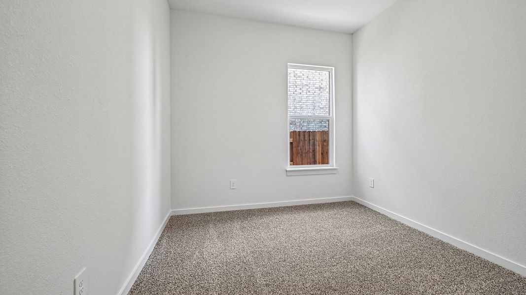 Spacious, unfurnished interior of a new home in The Enclave at Bar W Ranch, Leander (Image 36).