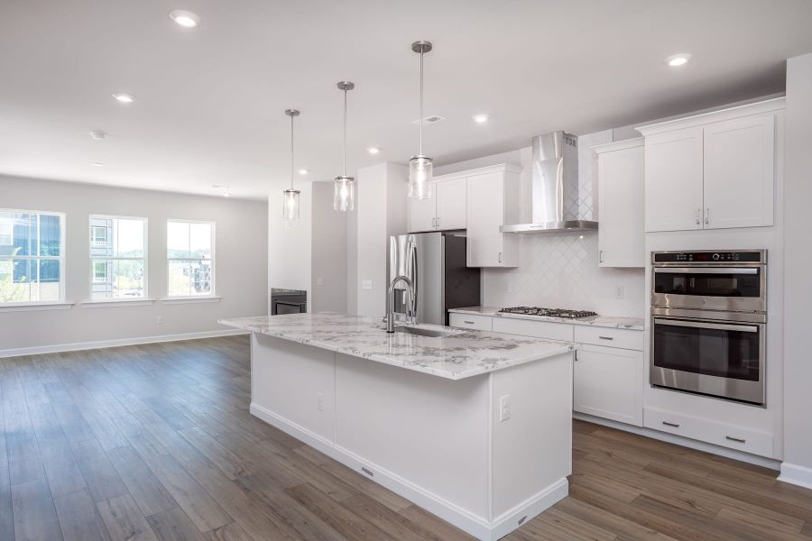 Representative furnished interior of a home built from the Kinston by Tri Pointe Homes in Elm Park, Raleigh (Image 7).