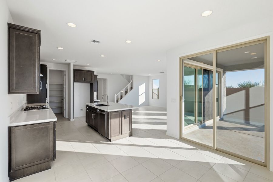 Representative furnished interior of a home built from the Triumph by Taylor Morrison in Artisan at Asante Encore Collection, Surprise (Image 9). Representative furnished interior of a home built from the Triumph by Taylor Morrison in Artisan at Asante Encore Collection, Surprise (Image 9).