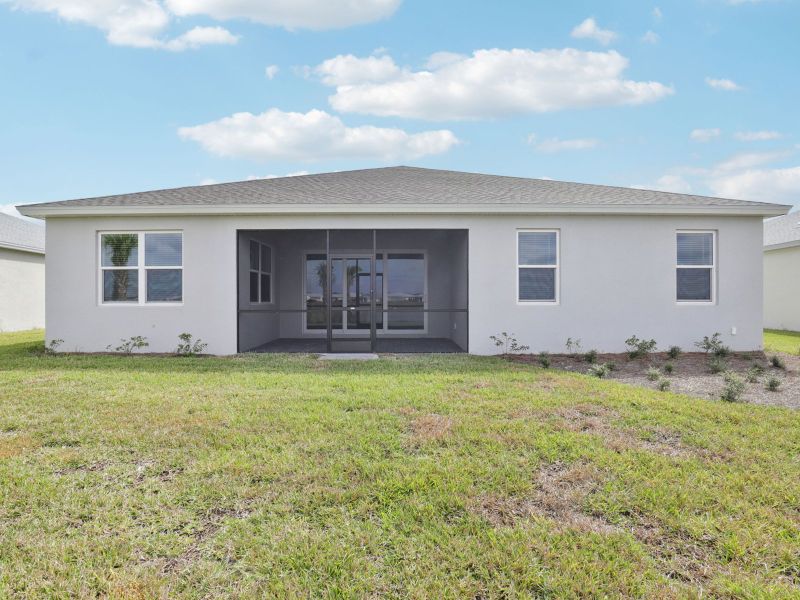 Exterior details and patio area of a home in Crescent Lakes - Signature Series, Punta Gorda (Image 3).