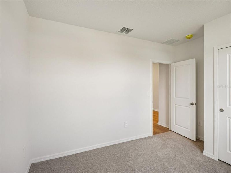 Spacious, unfurnished interior of a new home in The Reserve at Van Oaks, Auburndale (Image 18).
