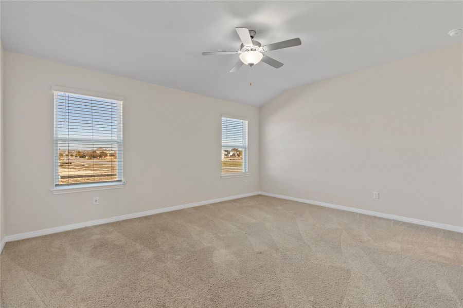 Master Bedroom Carpeted with a ceiling fan Master Bedroom Carpeted with a ceiling fan