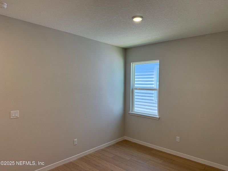 Spacious, unfurnished interior of a new home in The Preserve at Concourse Crossing, Fernandina Beach (Image 12).