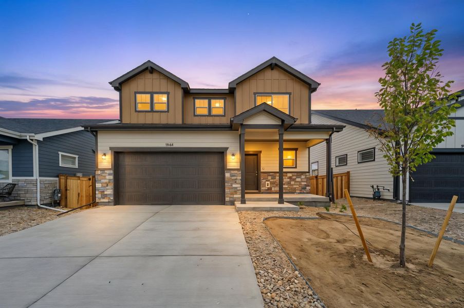 Front exterior of a new home in Granary, Johnstown, CO, highlighting curb appeal (Image 17).