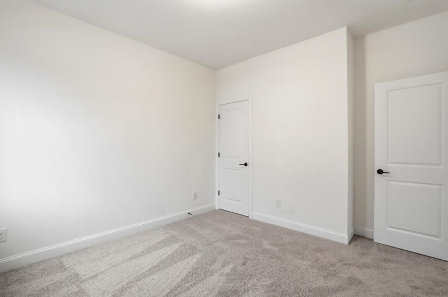 Spacious, unfurnished interior of a new home in Rone Creek, Waxhaw (Image 43).