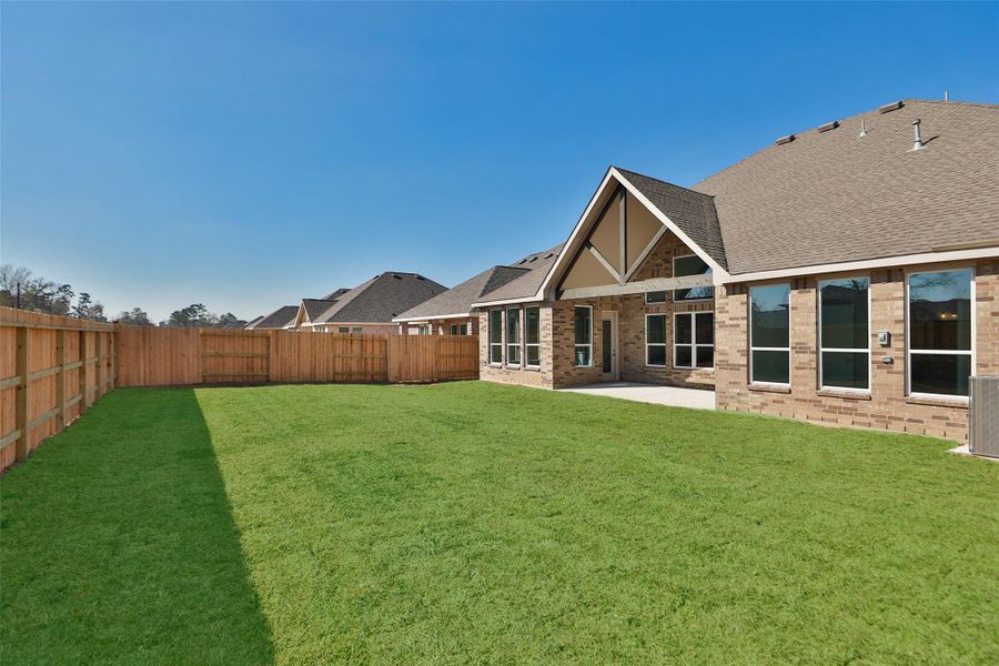 Exterior details and patio area of a home in Sundance Cove, Crosby (Image 24).