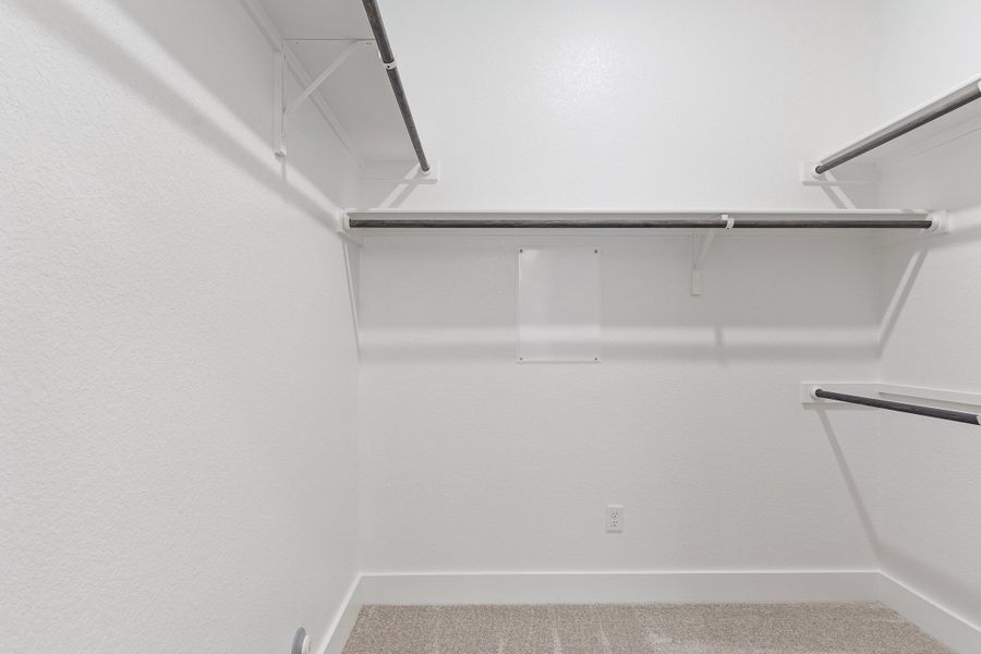 Representative unfurnished interior of a home built from the Waterville by Ashton Woods in The Trails at Carmel, Pflugerville (Image 51).