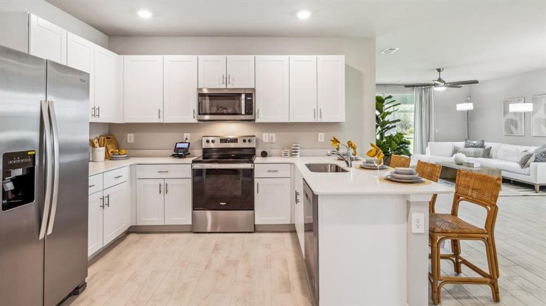 Furnished interior view inside a new home in Heritage Lake Park, Punta Gorda (Image 16).