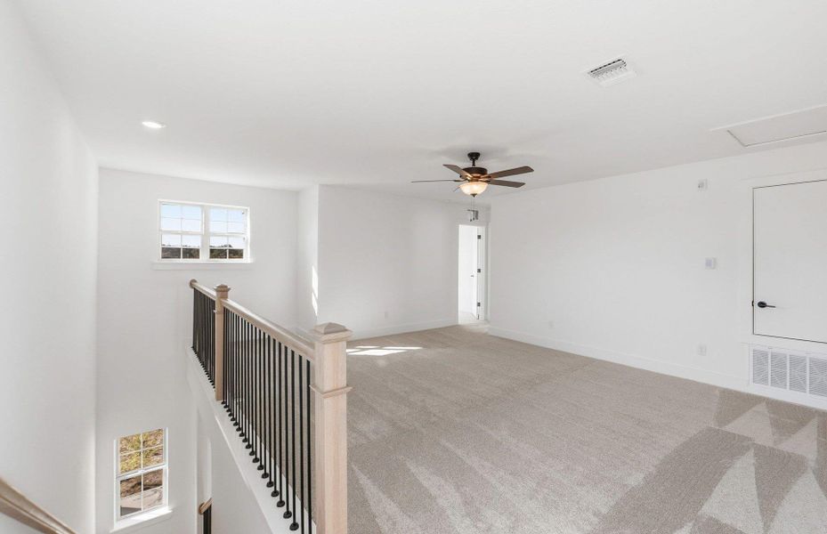 Spacious, unfurnished interior of a new home in Cameron Place, Manor (Image 14).