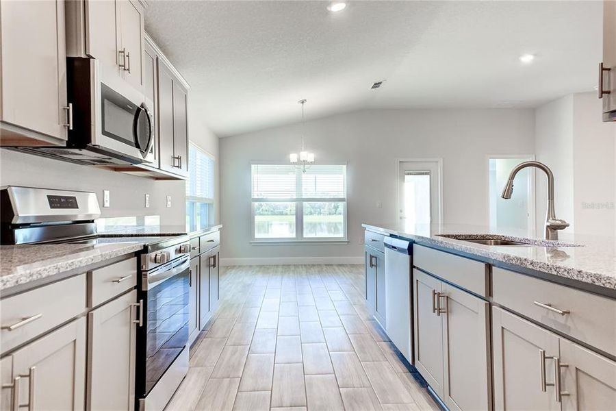 Furnished interior view inside a new home in Aviary at Rutland Ranch, Parrish (Image 12).