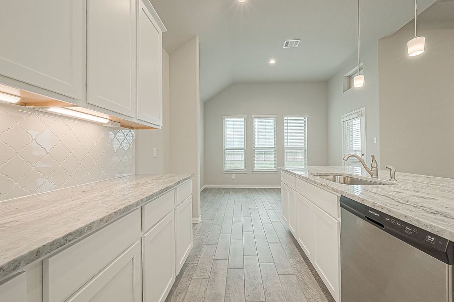 Representative furnished interior of a home built from the Floor Plan 2050 by Colina Homes in Grand Magnolia, Magnolia (Image 17).