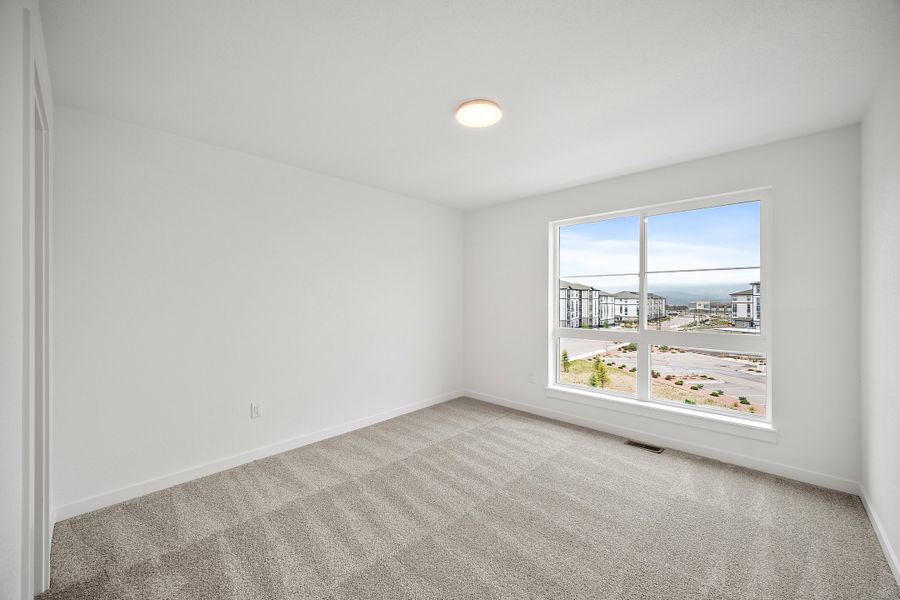 Spacious, unfurnished interior of a new home in The Commons at Victory Ridge, Colorado Springs (Image 22).