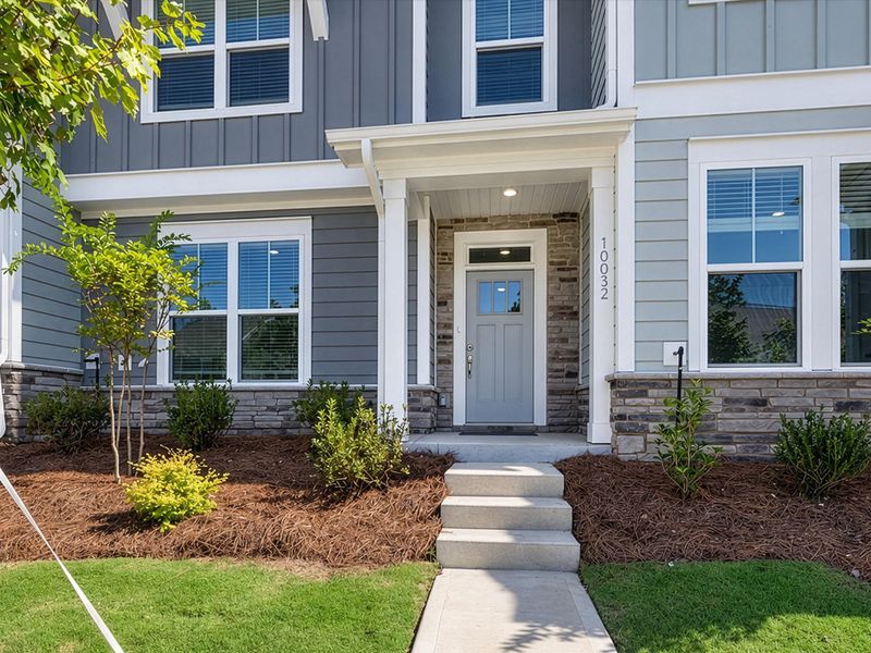 Exterior details and patio area of a home in North Creek Village - Townhomes, Huntersville (Image 16). Exterior details and patio area of a home in North Creek Village - Townhomes, Huntersville (Image 16).