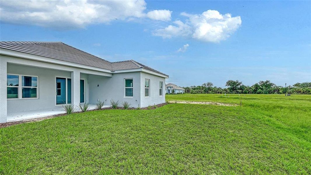 Exterior details and patio area of a home in Grand Park, Sarasota (Image 25). Exterior details and patio area of a home in Grand Park, Sarasota (Image 25).