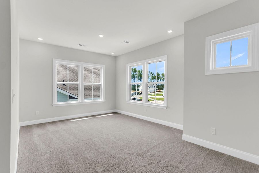 Spacious, unfurnished interior of a new home in Tidewater at Lakes of Cane Bay, Summerville (Image 25). Spacious, unfurnished interior of a new home in Tidewater at Lakes of Cane Bay, Summerville (Image 25).