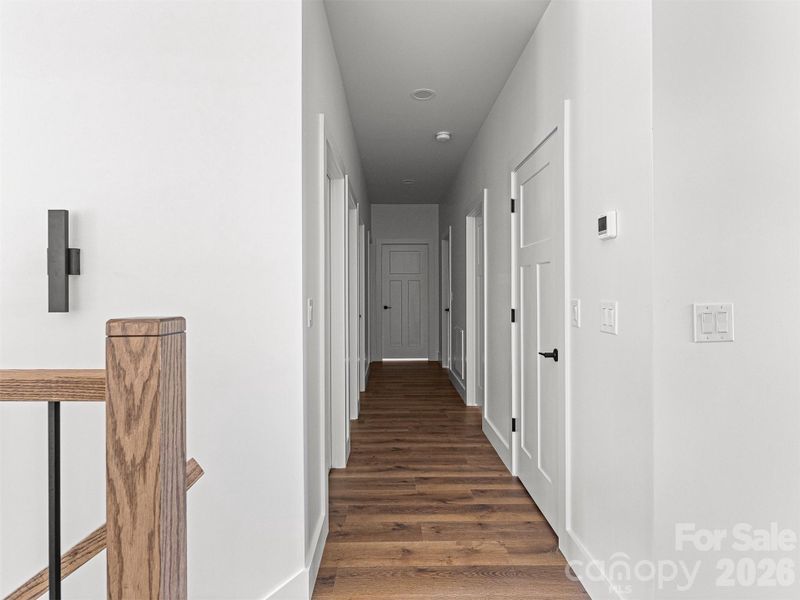 HALLWAY TO BEDROOMS/BATHROOMS/LAUNDRY