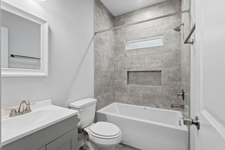 Furnished interior view inside a new home in Arrowhead Lakes, Willis (Image 10).