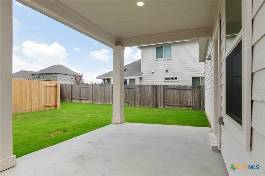 Exterior details and patio area of a home in Crosswinds, Kyle (Image 3).