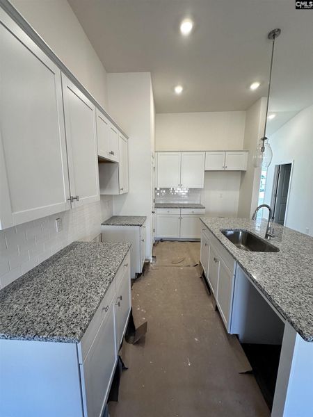 Furnished interior view inside a new home in Piney Woods Bluff, Columbia (Image 6).