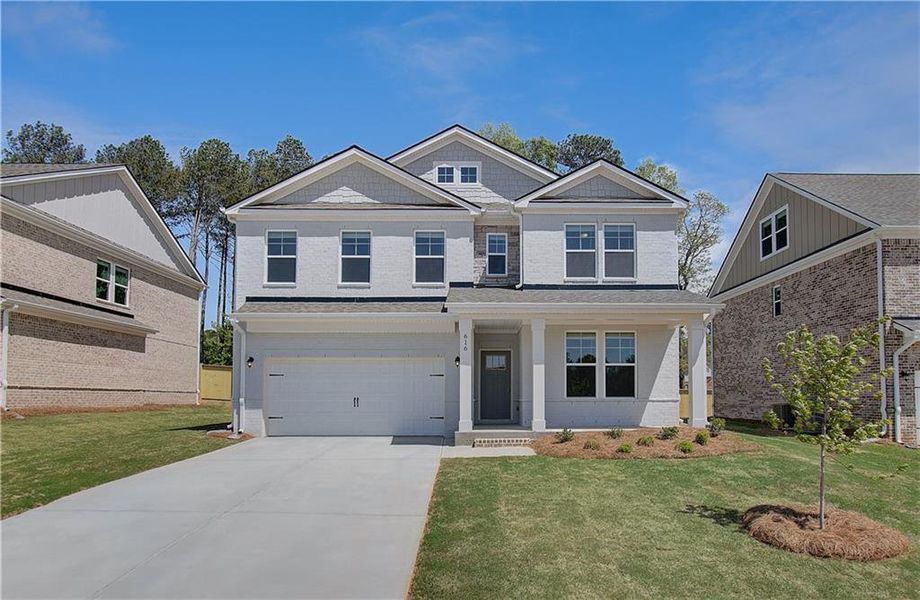 Front exterior of a new home in Bowers Farm, McDonough, GA, highlighting curb appeal (Image 2). Front exterior of a new home in Bowers Farm, McDonough, GA, highlighting curb appeal (Image 2).