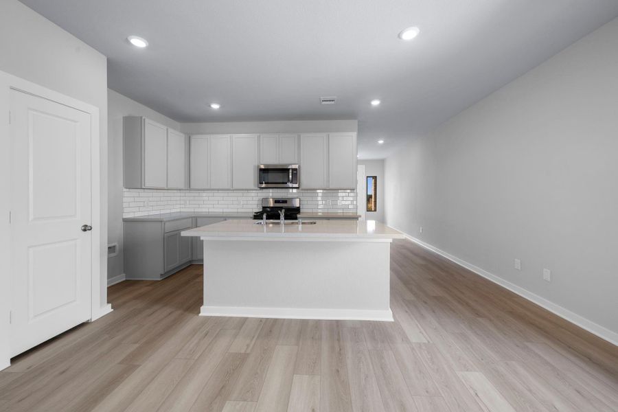 Furnished interior view inside a new home in Westridge Cove, Conroe (Image 7).