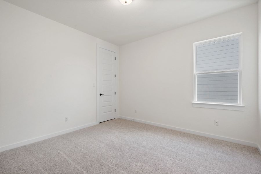 Spacious, unfurnished interior of a new home in Heritage, Dripping Springs (Image 47).