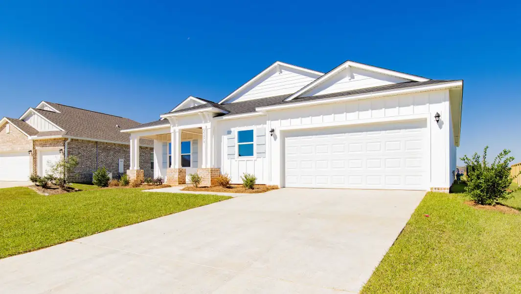Front exterior of a new home in Palm Bay, Palm Bay, FL, highlighting curb appeal (Image 17).
