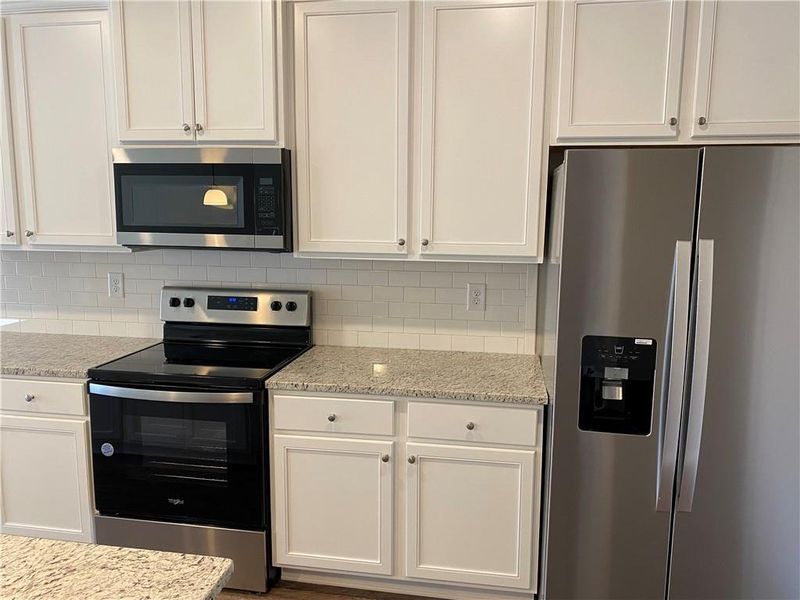 Furnished interior view inside a new home in , Oakwood (Image 6). Furnished interior view inside a new home in , Oakwood (Image 6).