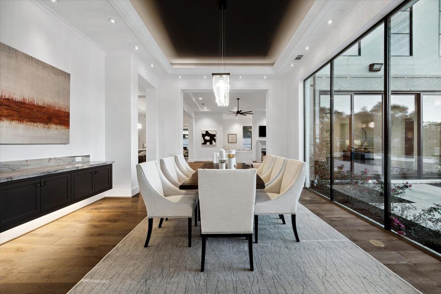 Spacious and refined dining room, ideal for formal entertaining and special occasions with family and friends.