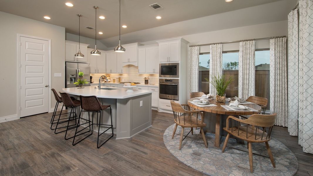 Representative furnished interior of a home built from the 2935M by Perry Homes in Lakes of Cane Island, Katy (Image 9).
