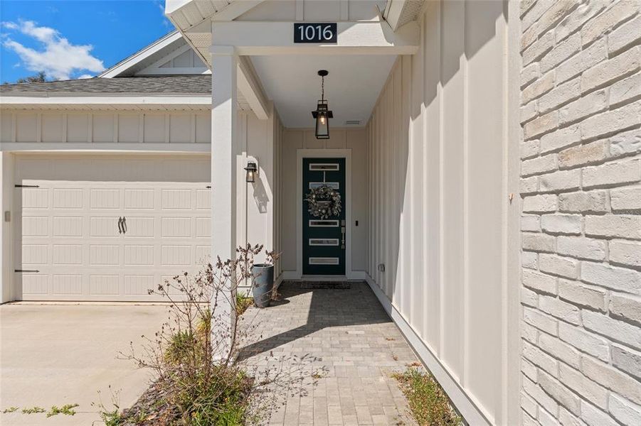 Exterior details and patio area of a home in Fairway Pointe at West End, Newberry (Image 3).