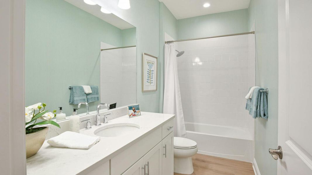 Furnished interior view inside a new home in Palm Grove Real Estate and Homes for Sale in Lakewood Ranch, FL - Neal Communities, Lakewood Ranch (Image 31).