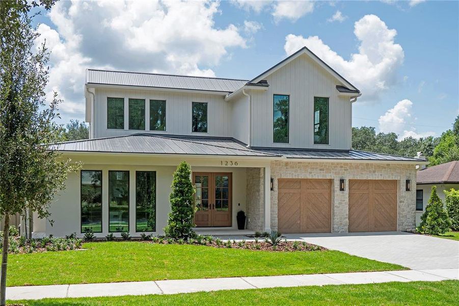 Front exterior of a new home in , Orlando, FL, highlighting curb appeal (Image 2).