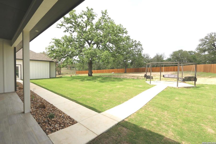 Exterior details and patio area of a home in , La Vernia (Image 58).