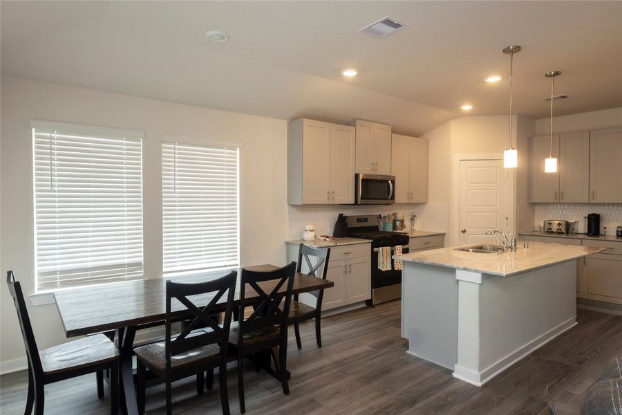 Furnished interior view inside a new home in Sundance Cove - Classic Series, Crosby (Image 9).
