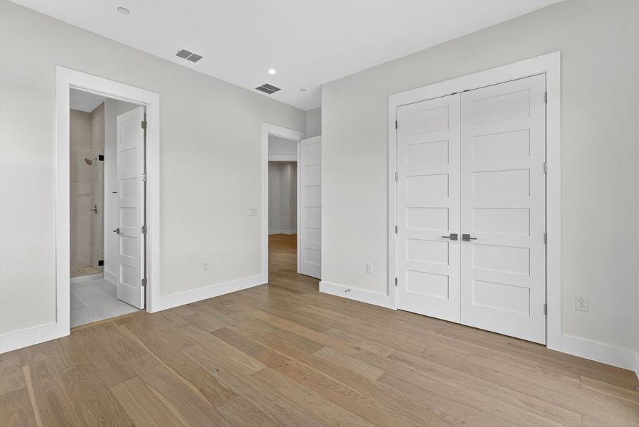Spacious, unfurnished interior of a new home in Milky Way at River Place, Austin (Image 30).