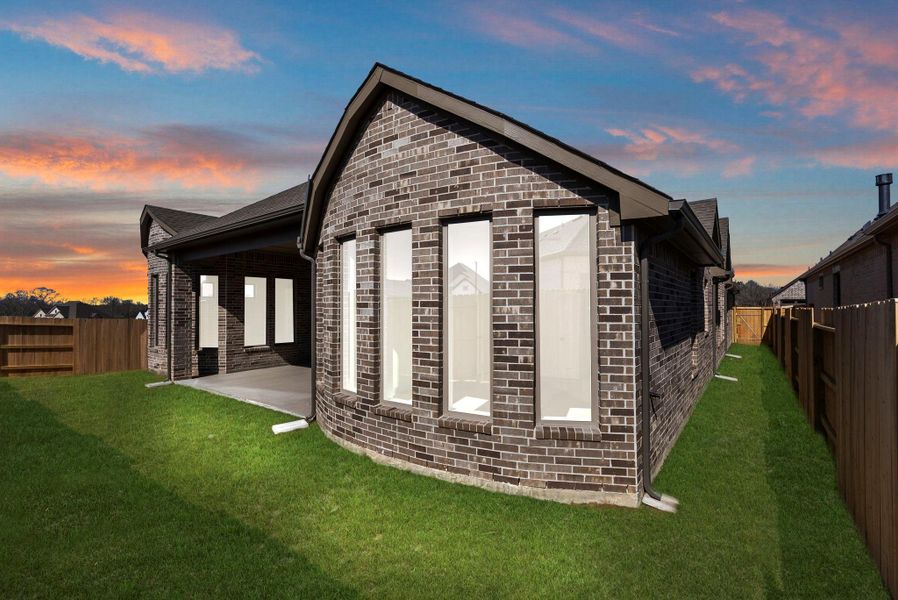 Exterior details and patio area of a home in Chambers Creek, Willis (Image 3).