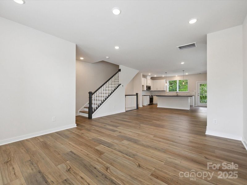 Spacious, unfurnished interior of a new home in Central Living at Craig, Charlotte (Image 28).