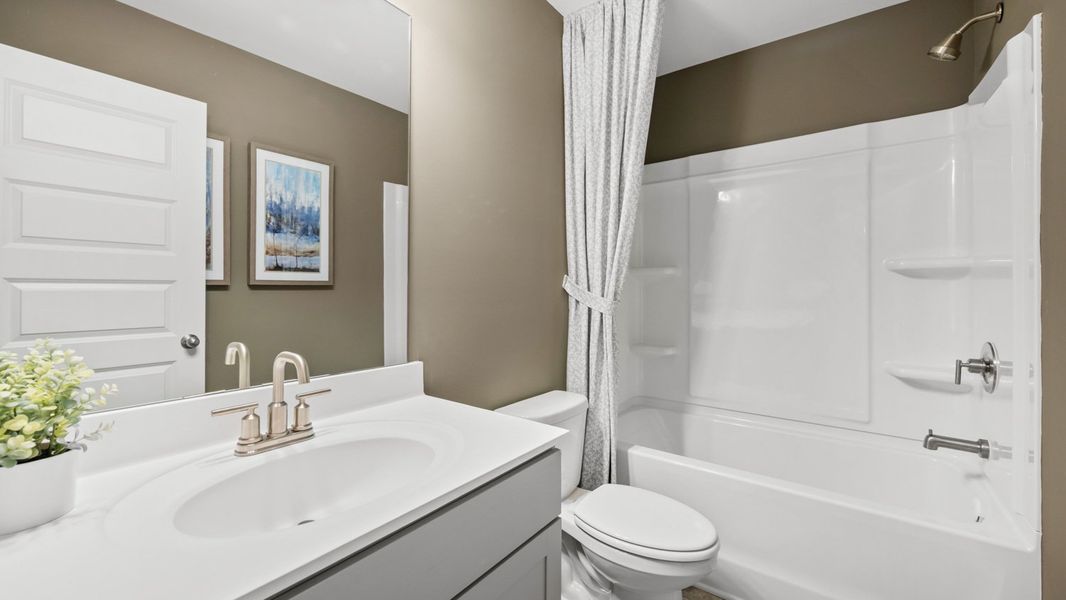 Representative furnished interior of a home built from the Savannah by D.R. Horton in Water Oak Estates, Lawrenceville (Image 18).