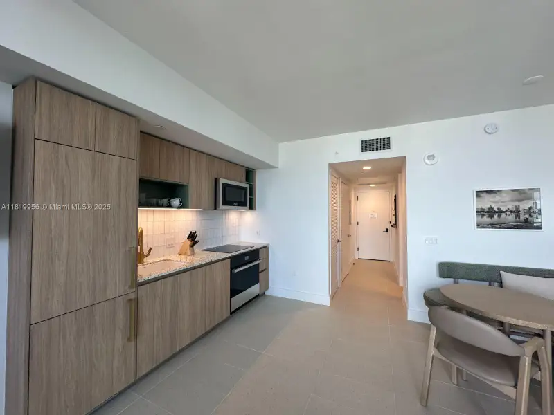 Furnished interior view inside a new home in , Miami (Image 2).