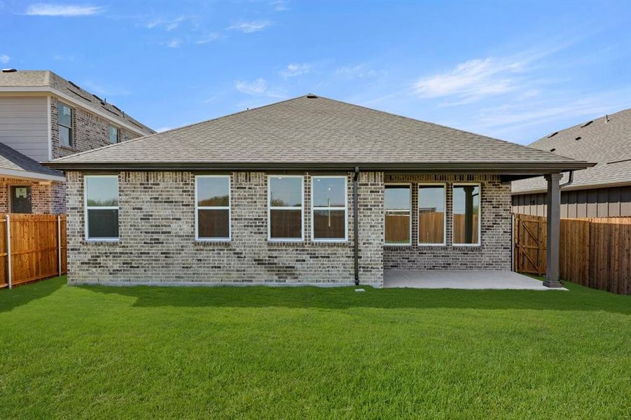 Exterior details and patio area of a home in Coyote Meadows 50s, Anna (Image 3). Exterior details and patio area of a home in Coyote Meadows 50s, Anna (Image 3).