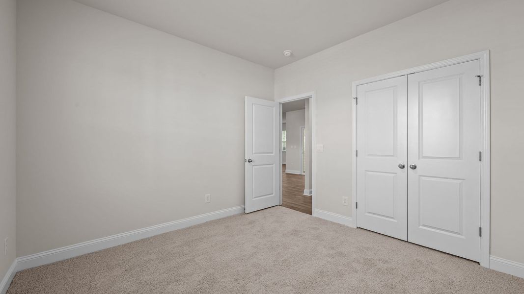 Spacious, unfurnished interior of a new home in Tyler - Home on the Lake, New Bern (Image 23).