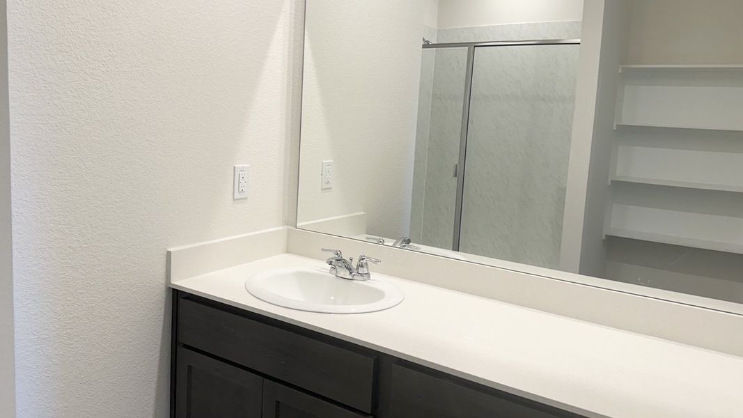 Representative furnished interior of a home built from the MIDLAND by D.R. Horton in Northspur, Forney (Image 7).