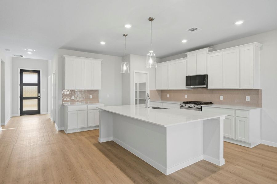 Furnished interior view inside a new home in Sunterra Lakes, Brookshire (Image 7).