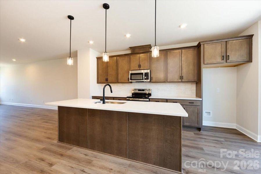 Chef Inspired Kitchen with Warm Cabinets Chef Inspired Kitchen with Warm Cabinets
