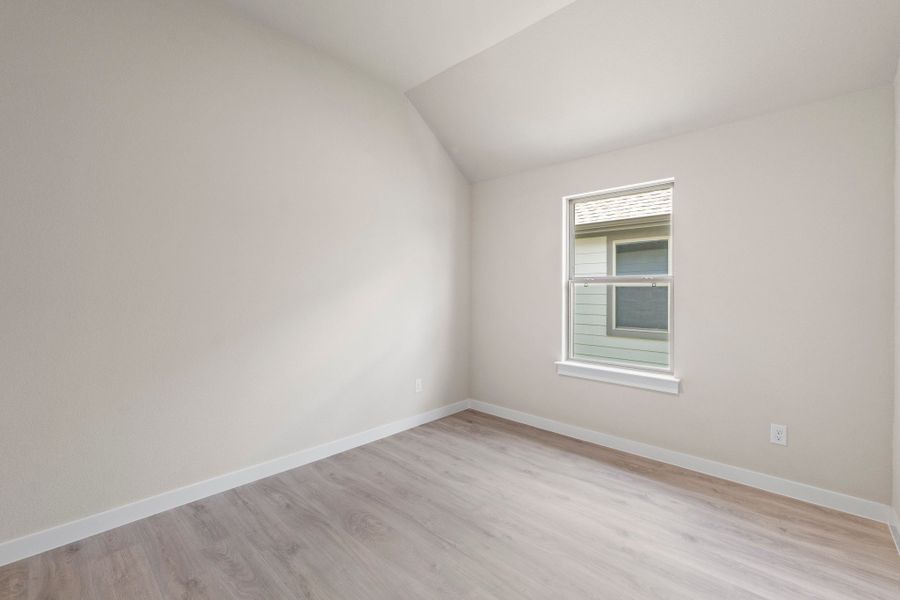 Representative unfurnished interior of a home built from the Nueces by Trophy Signature Homes in Prairie Winds, Hutto (Image 27).