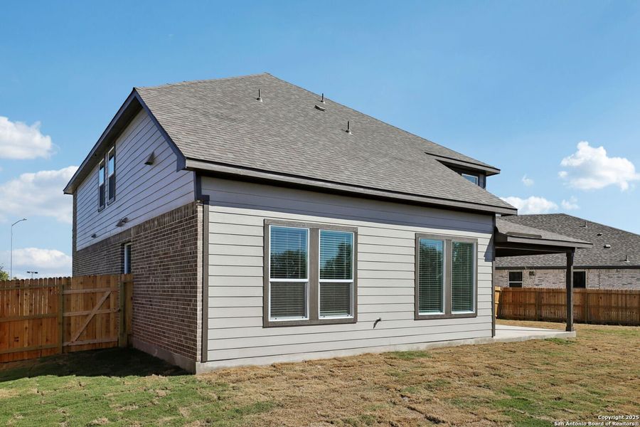 Exterior details and patio area of a home in Carmel Ranch, Schertz (Image 26).