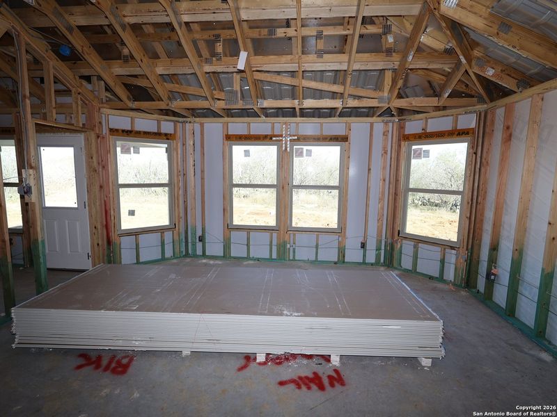 In-progress construction of a new home in Chaparral Ranch, Floresville, TX (Image 31).